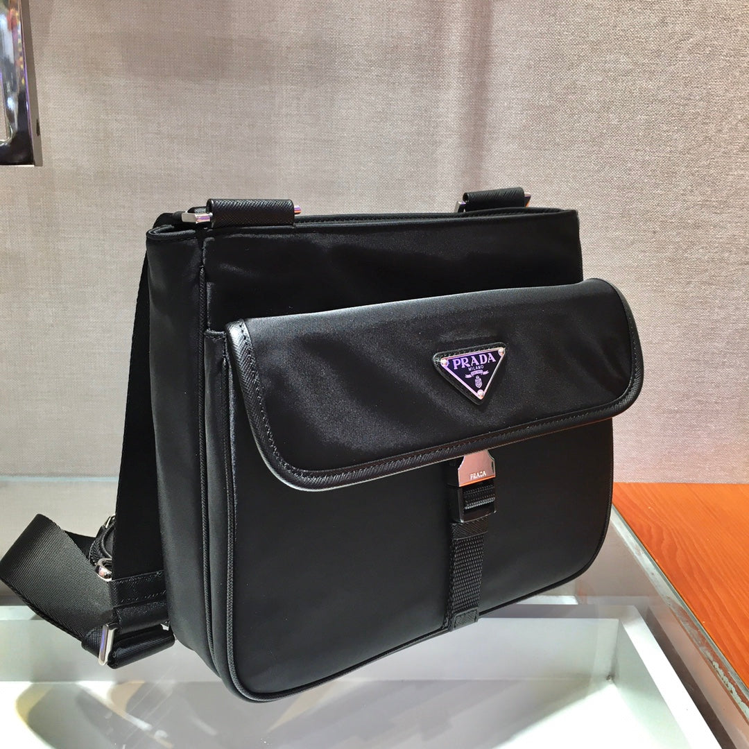 PRADA TRIANGLE LOGO CROSSBODY BAG 25 IN BLACK RE-NYLON AND SAFFIANO LEATHER TRIM