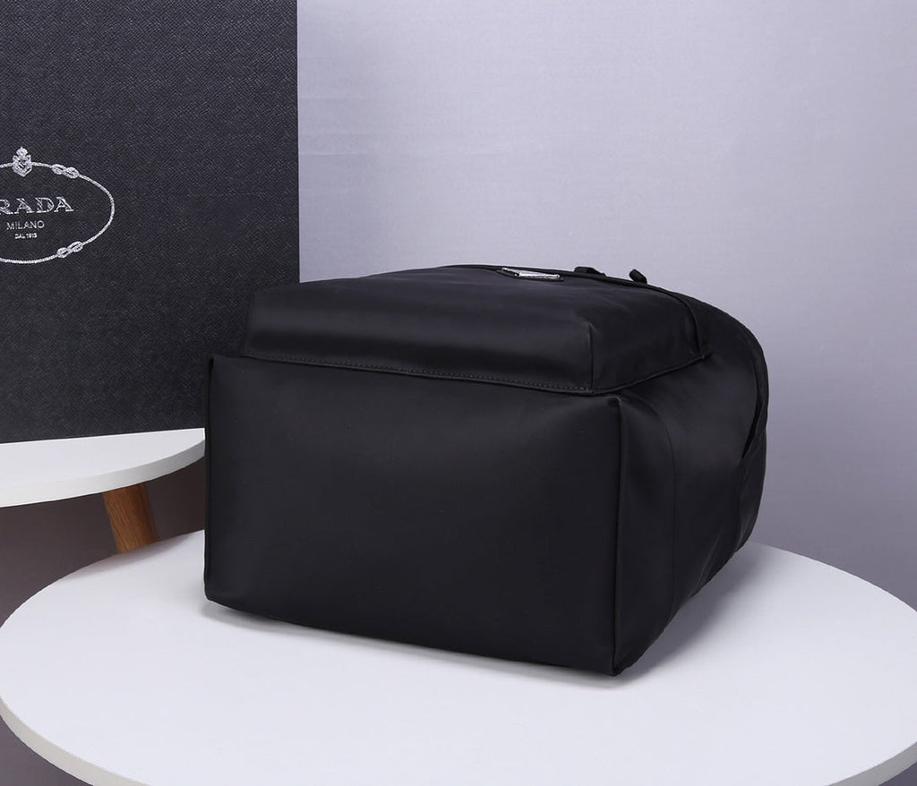 PRADA BACKPACK 39 IN BLACK RE-NYLON AND SAFFIANO LEATHER