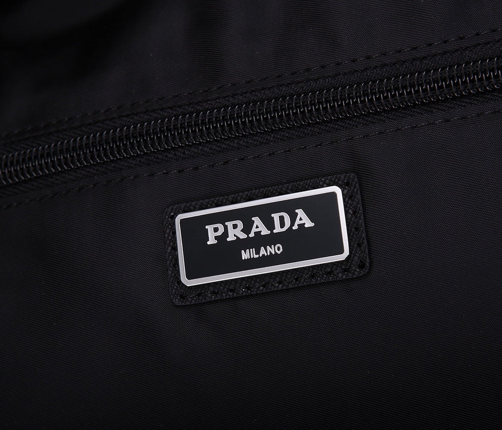 PRADA BACKPACK 39 IN BLACK RE-NYLON AND SAFFIANO LEATHER
