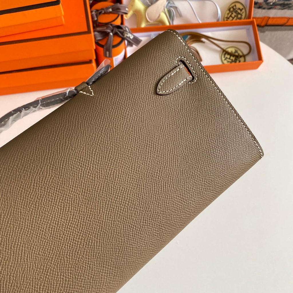 HERMES KELLY CUT 31 IN MOCHA BROWN CALFSKIN WITH GOLD HARDWARE