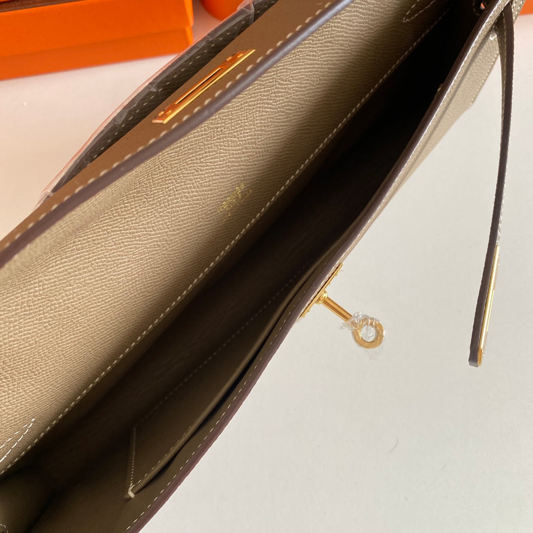 HERMES KELLY CUT 31 IN MOCHA BROWN CALFSKIN WITH GOLD HARDWARE