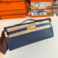 HERMES KELLY CUT 31 IN CLASSIC BLUE CALFSKIN WITH GOLD HARDWARE