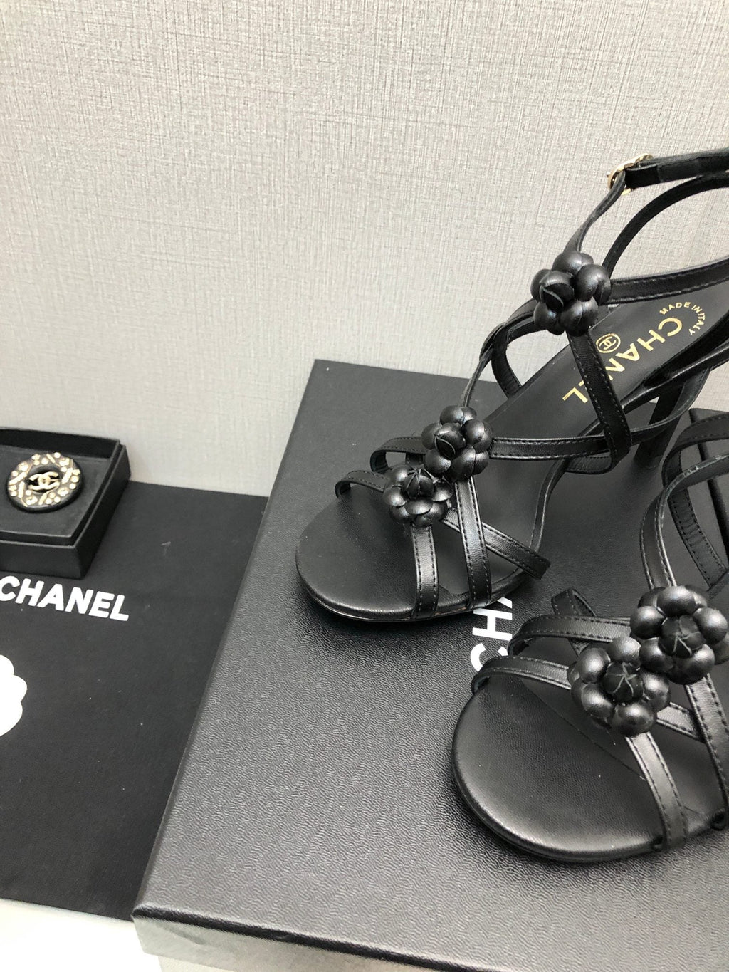 CHANEL FLORAL HIGH HEEL SANDAL IN BLACK LAMBSKIN