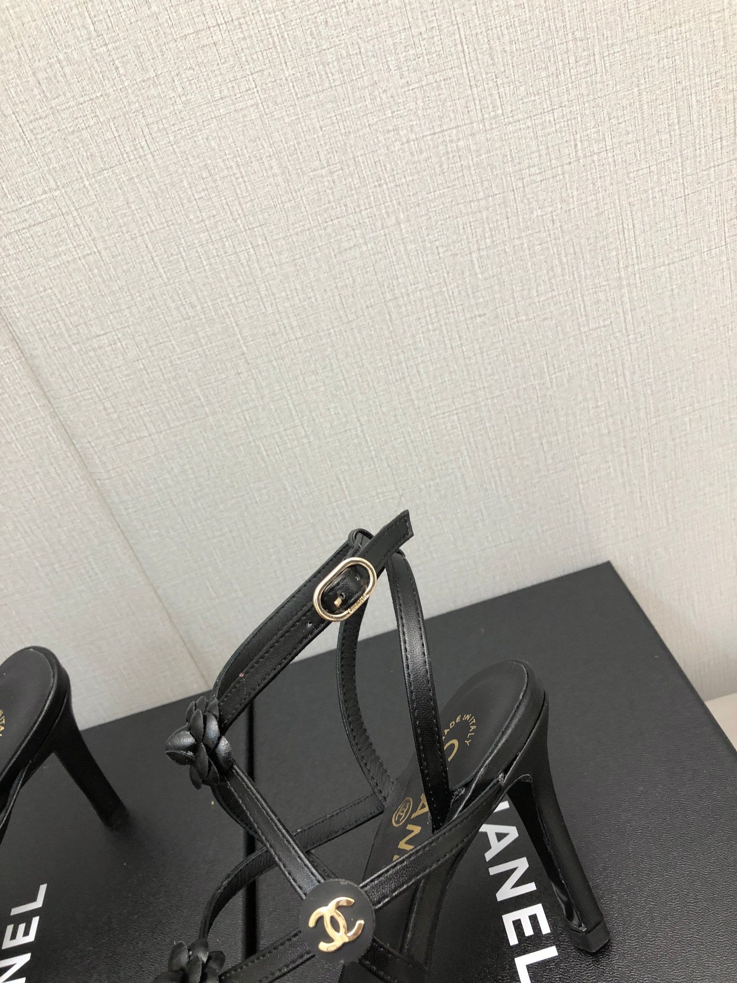 CHANEL FLORAL HIGH HEEL SANDAL IN BLACK LAMBSKIN