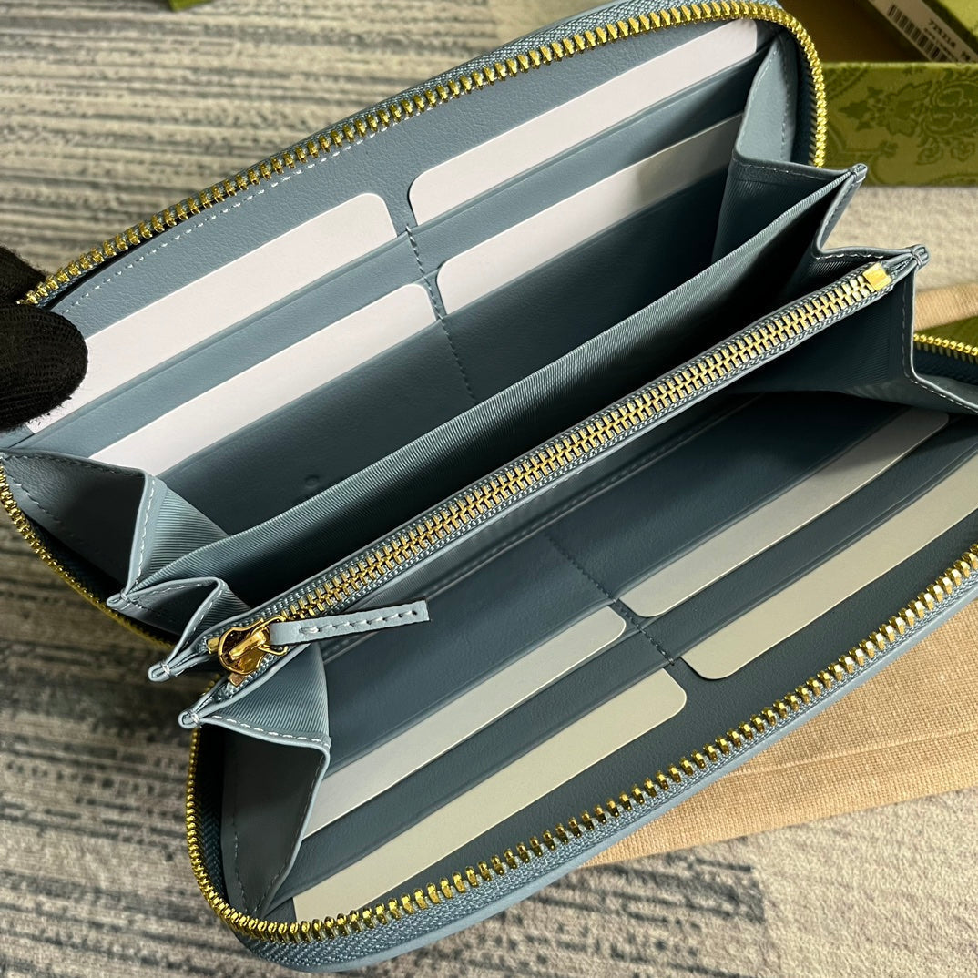 GUCCI BLONDIE 21 FULL ZIP WALLET IN BLUE PASTEL CALFSKIN