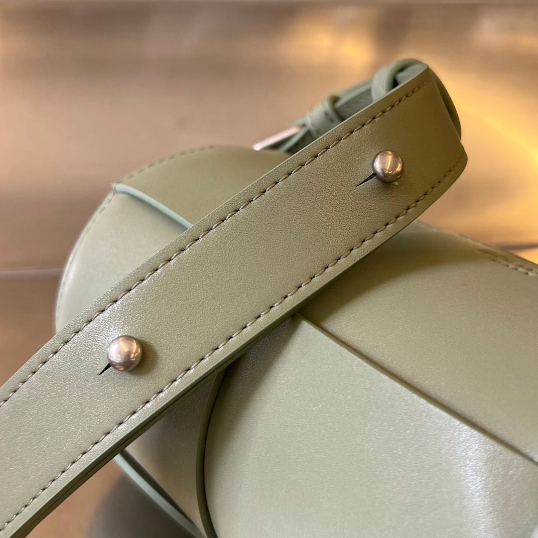 BOTTEGA VENETA SMALL CYLINDER CASSETTE 21 IN TRAVERTINE CALFSKIN