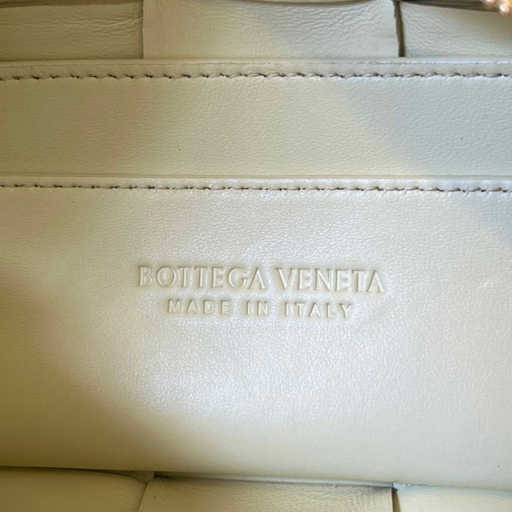 BOTTEGA VENETA BRICK CASSETTE 28 IN PASTEL YELLOW CALFSKIN