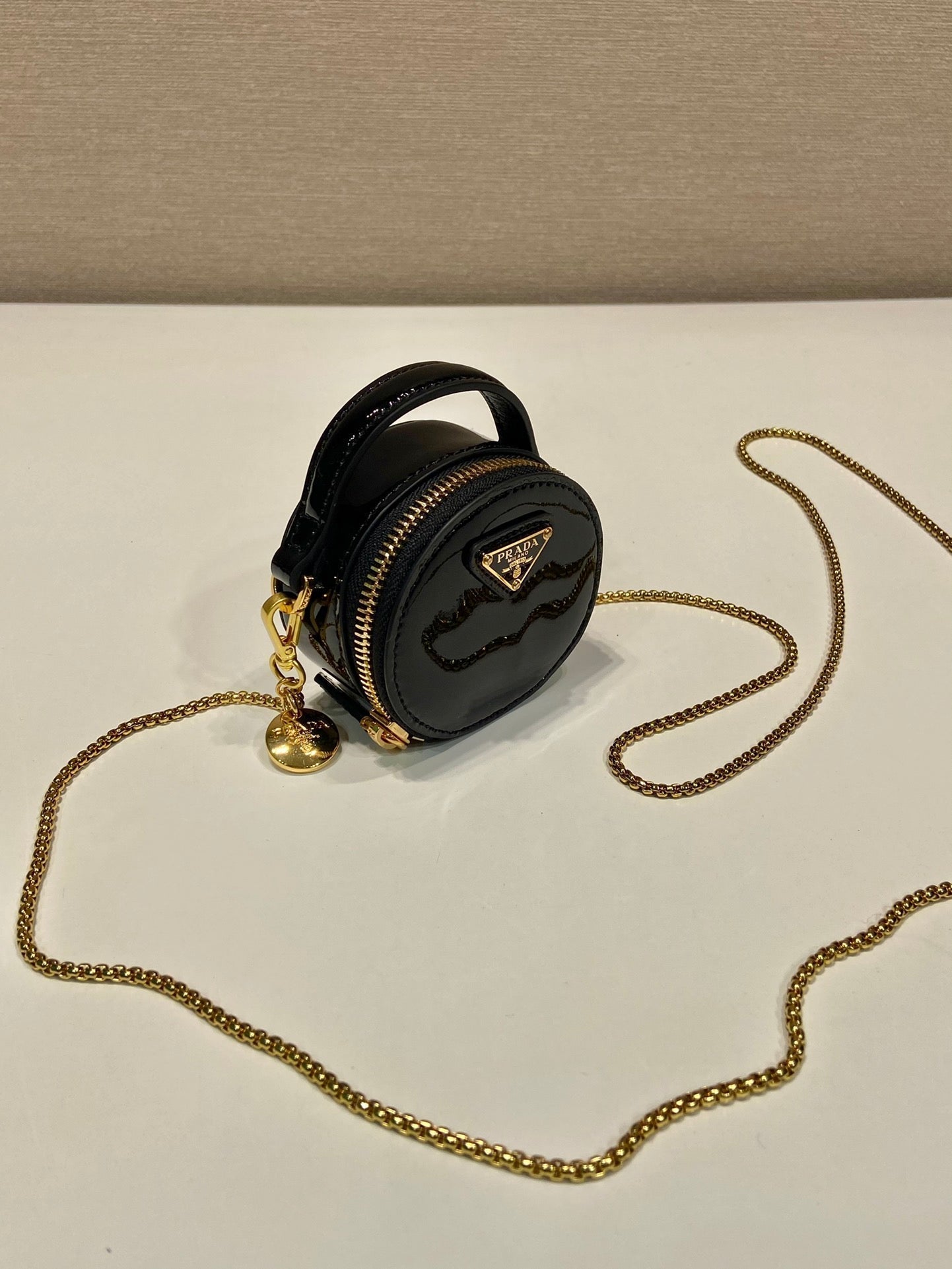 PRADA MINI ROUND BAG 8 IN BLACK GLOSSY CALFSKIN GOLD HARDWARE