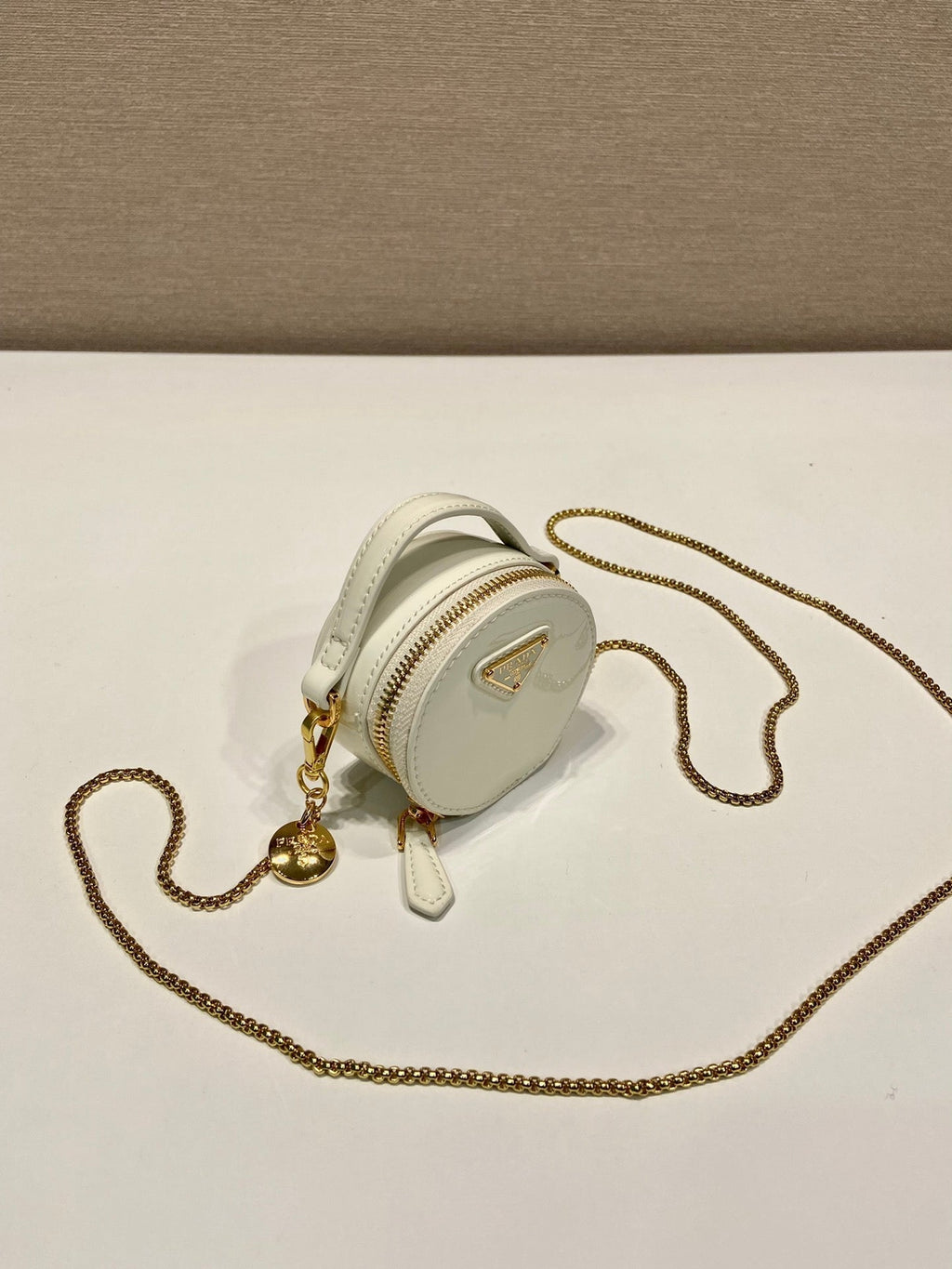 PRADA MINI ROUND BAG 8 IN WHITE GLOSSY CALFSKIN GOLD HARDWARE