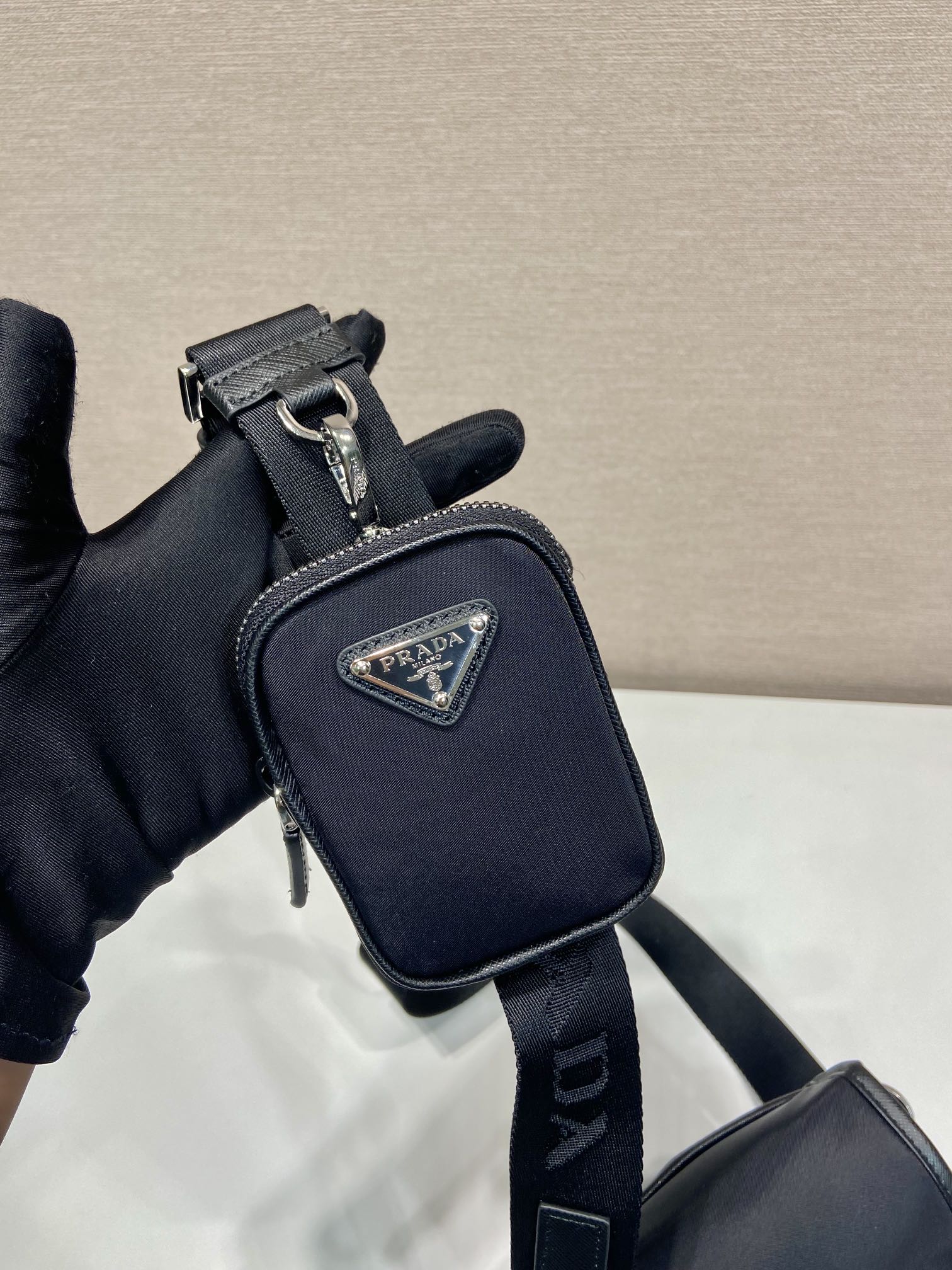 PRADA PHONE BAG 19 IN BLACK RE-NYLON AND SAFFIANO LEATHER TRIM