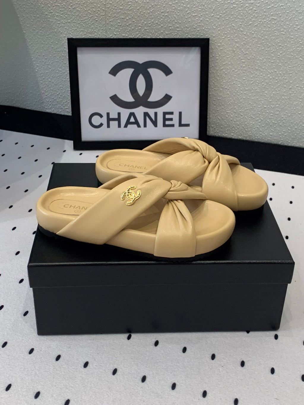 CHANEL TWISTED SLIPPERS IN DARK CREAM LAMBSKIN