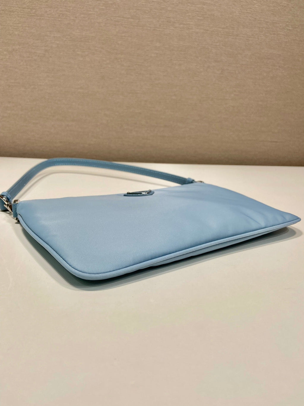 PRADA SHOULDER BAG 24 WITH TRIANGLE LOGO IN SKY BLUE RE-NYLON FABRIC