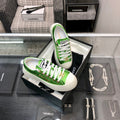 CHANEL CASUAL SNEAKER IN EMERALD GREEN METALLIC LAMBSKIN WITH GOLD LOGO