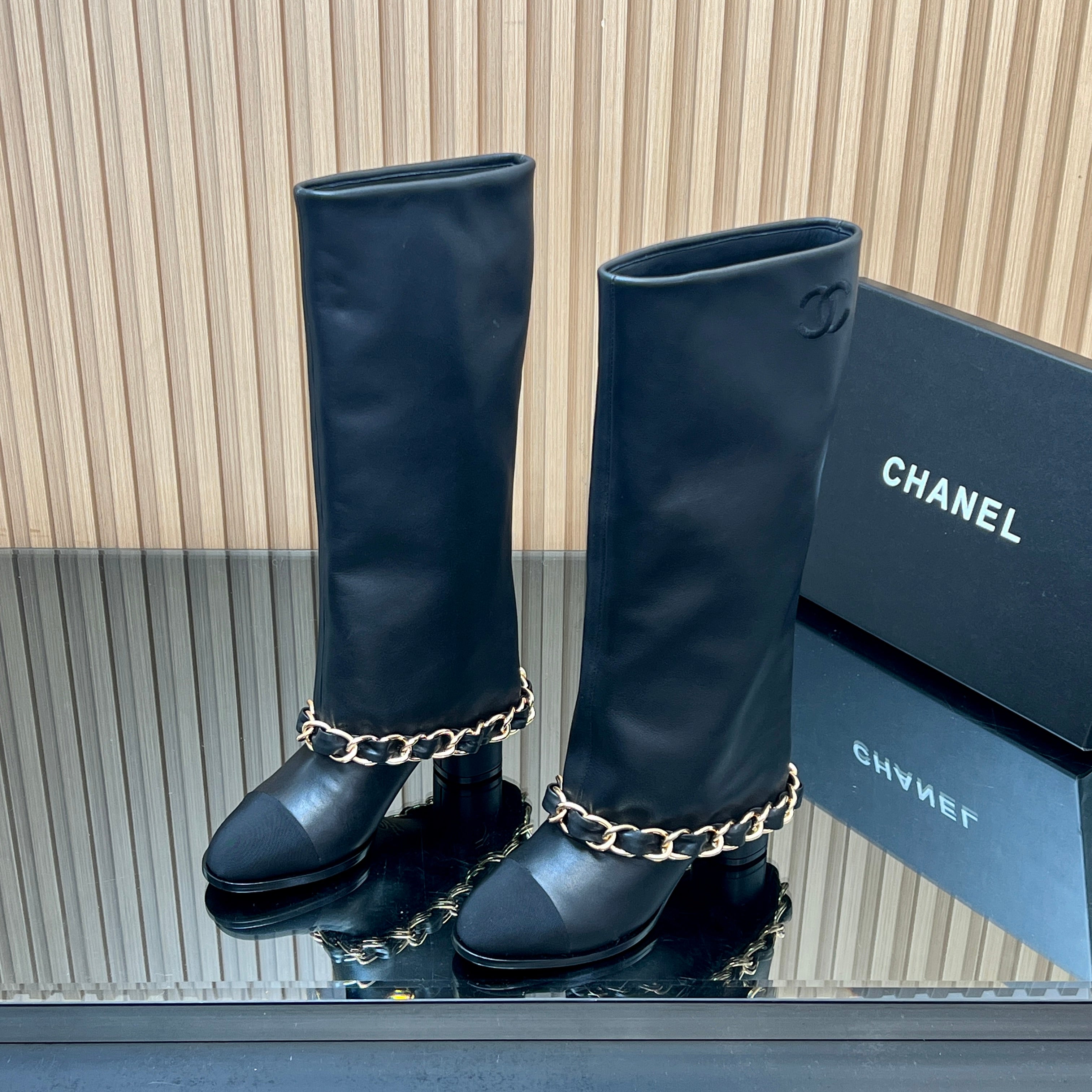 CHANEL 25S KNEE-HIGH HEELED BOOTS 65MM IN BLACK CALFSKIN GOLD HARDWARE