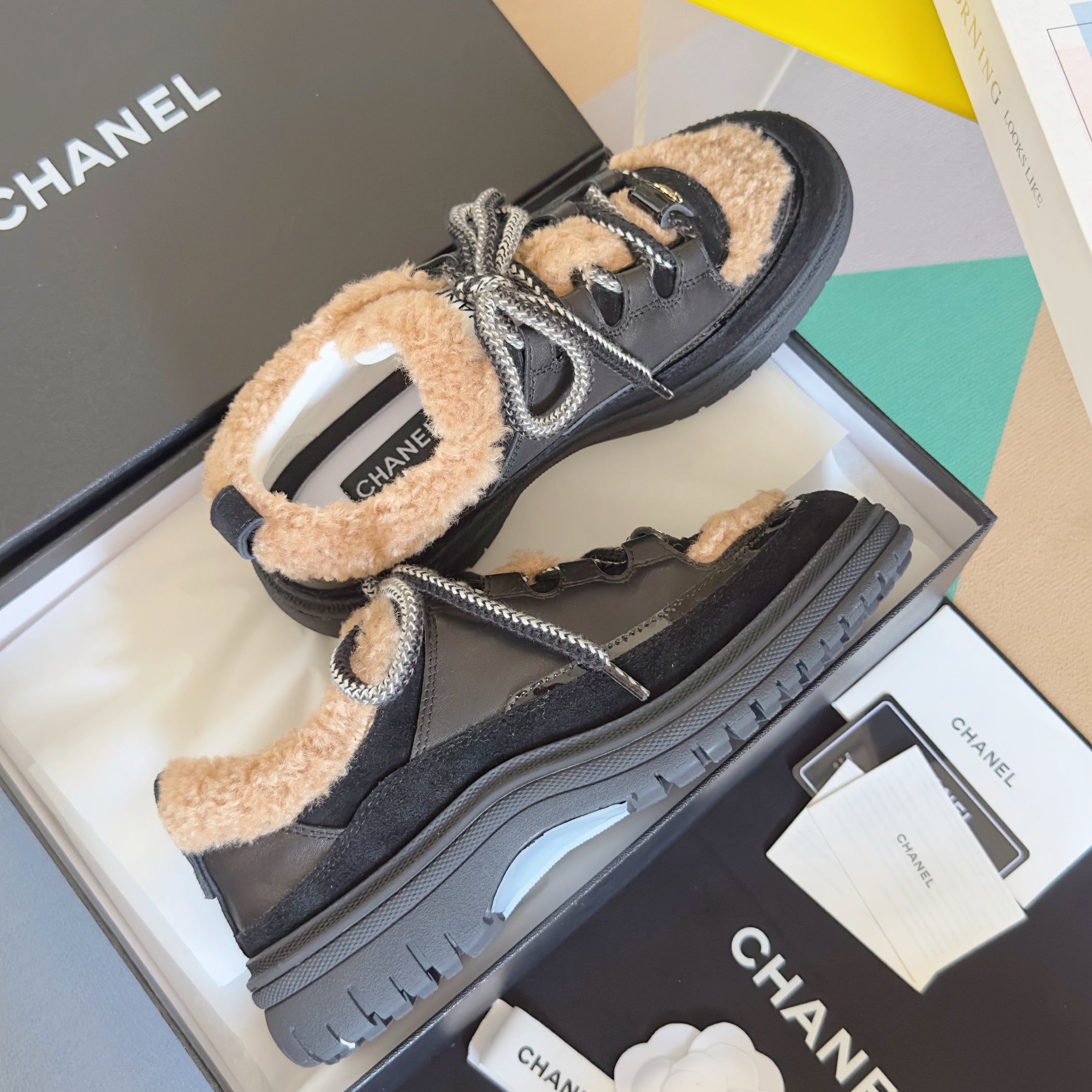 CHANEL 25S SNEAKERS WITH FUR AENTS 40MM IN BLACK AND BROWN CALFSKIN
