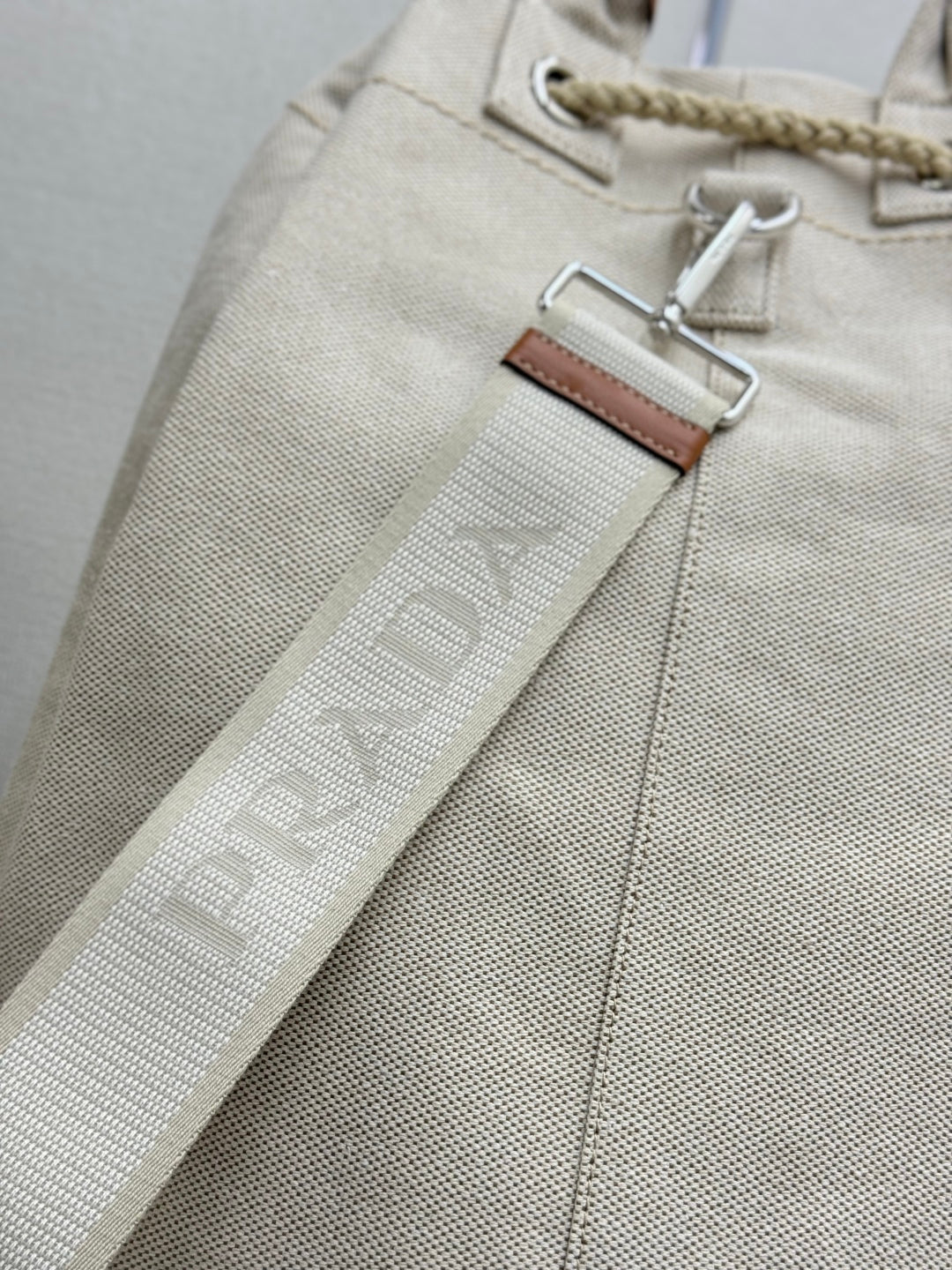 PRADA 25S DRAWSTRING BACKPACK 55 IN BEIGE CANVAS LINEN SILVER HARDWRE