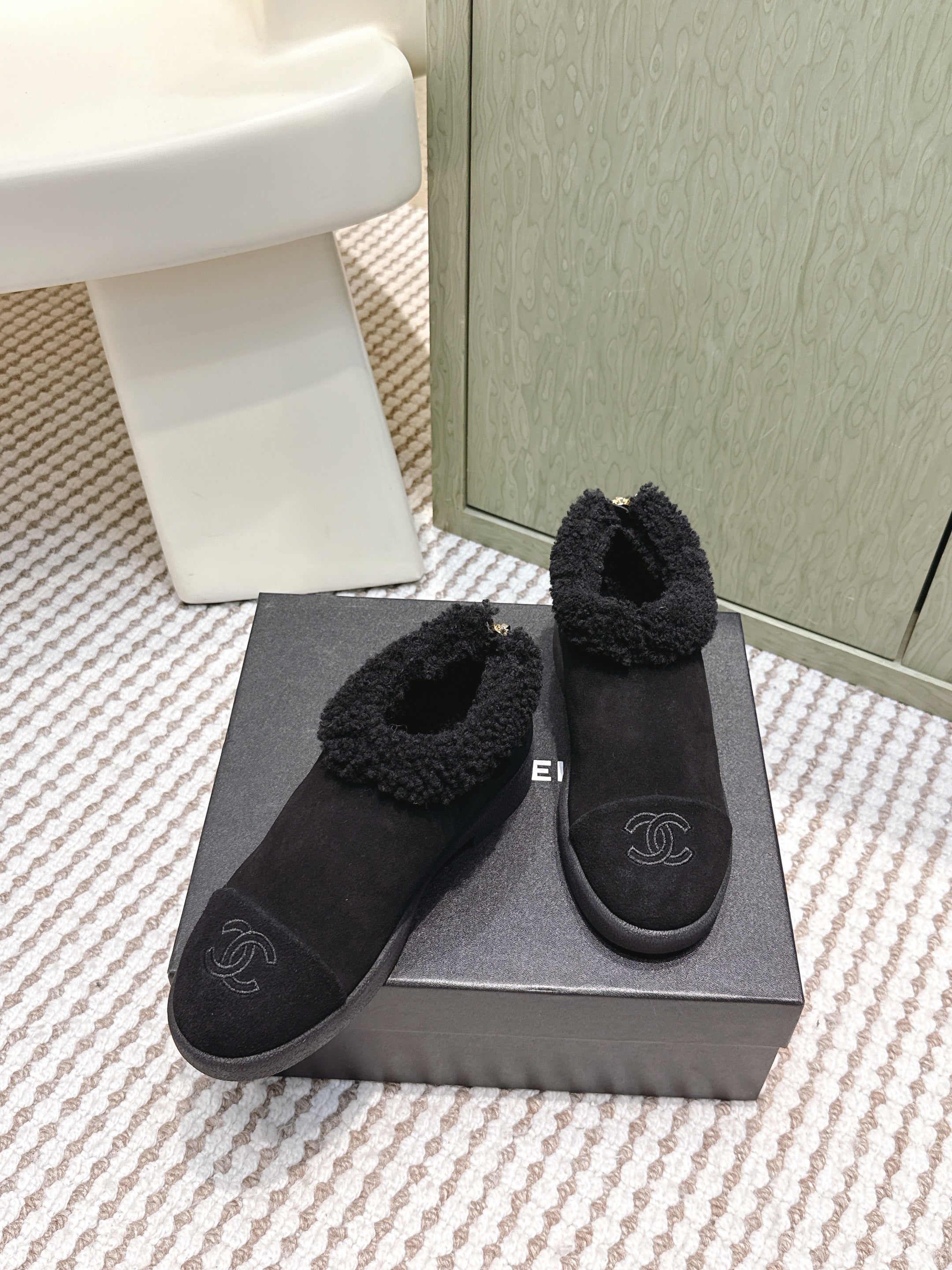CHANEL 25S SHORT SUEDE BOOTS IN BLACK WITH SHEEPSKIN LINING