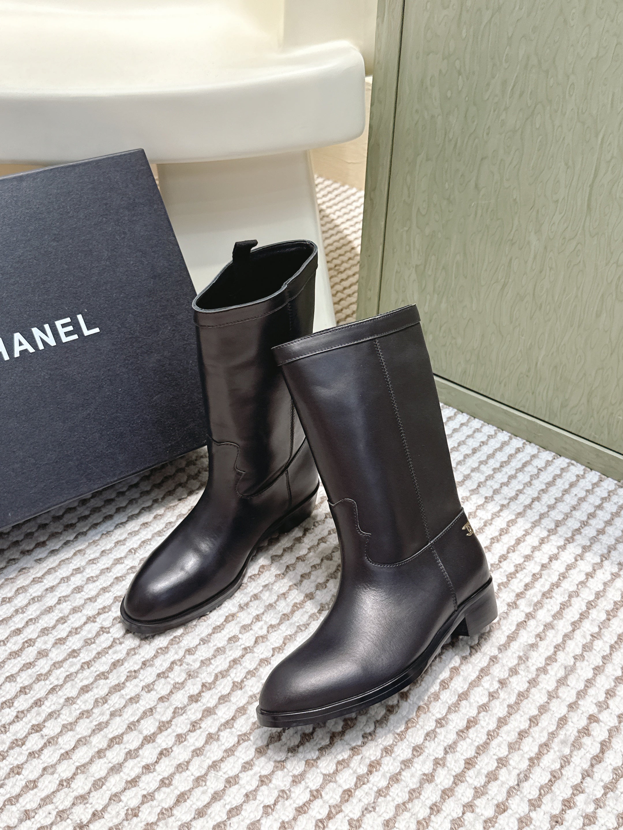 CHANEL 25S MID-CALF BOOTS IN BLACK CALFSKIN