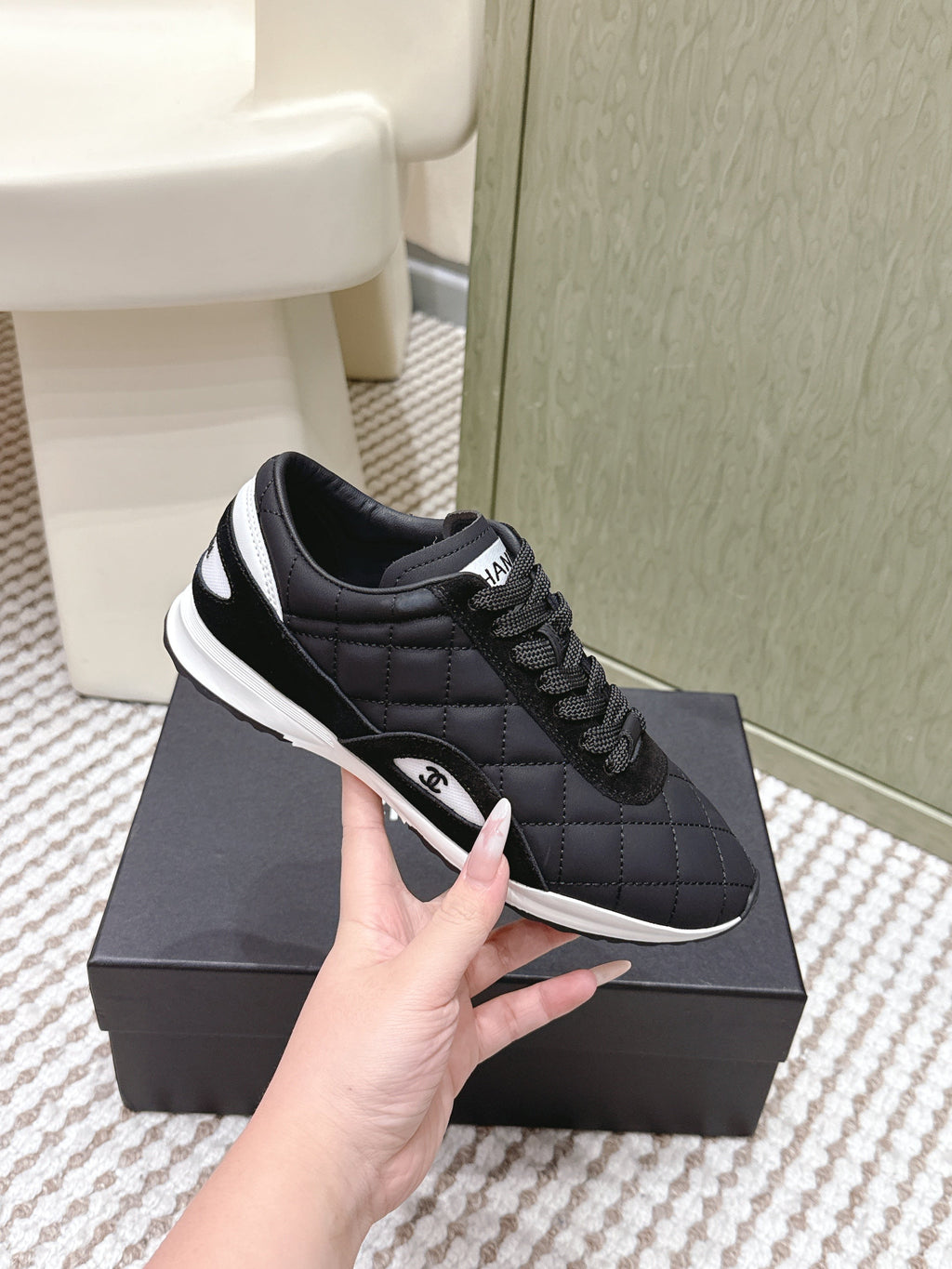CHANEL 25S SNEAKERS IN BLACK CALFSKIN AND SUEDE