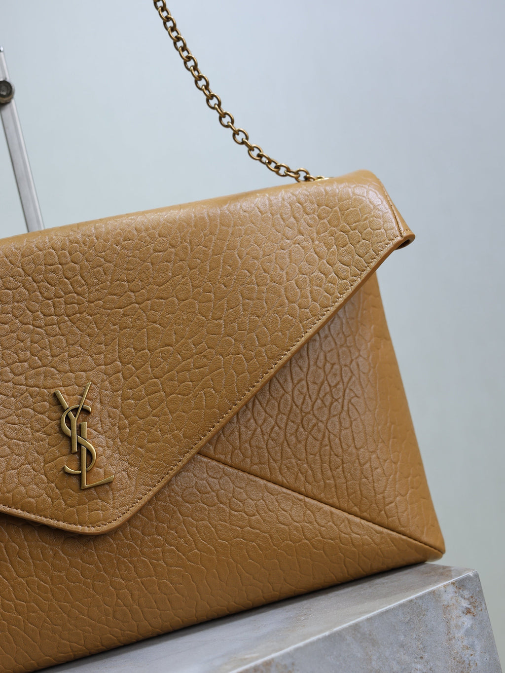 YSL 25S CASSANDRE ENVELOPE MESSENGER 35 IN GOLDEN BROWN LAMBSKIN GOLD HARDWRE