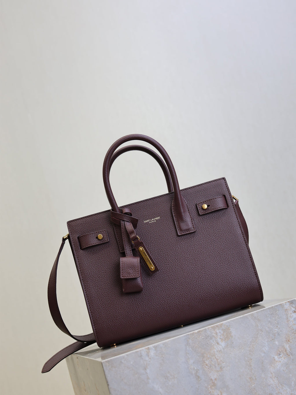 YSL 25S SAC DE JOUR MM 26 IN ROUGE CABERNET SUPPLE GRAINED CALFSKIN