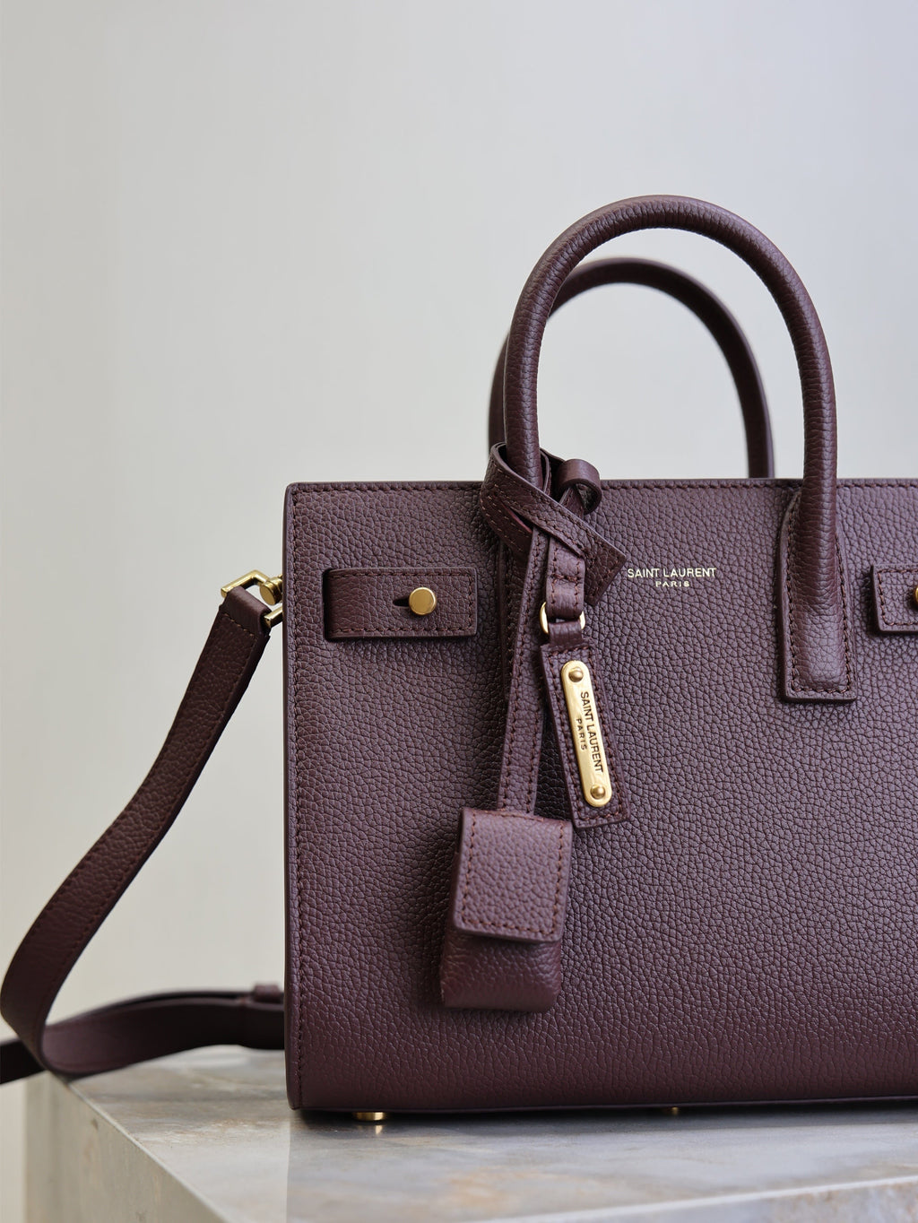 YSL 25S SAC DE JOUR 22 IN ROUGE CABERNET SUPPLE GRAINED CALFSKIN