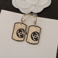 18K  Chanel Plate Earrings