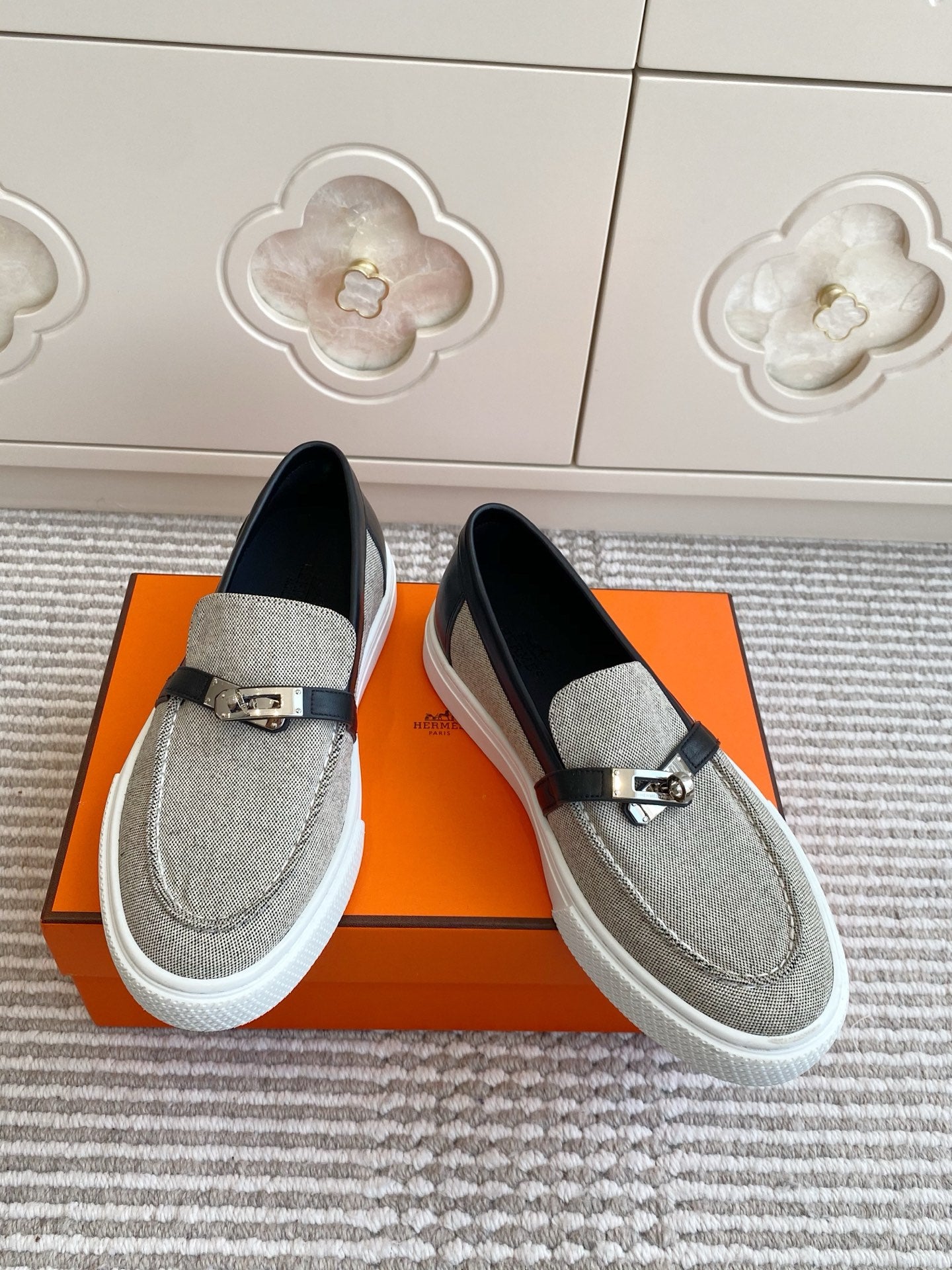 HERMES 25S SLIP-ON IN GREY CANVAS AND BLACK LAMBSKIN WITH SILVER HARDWARE