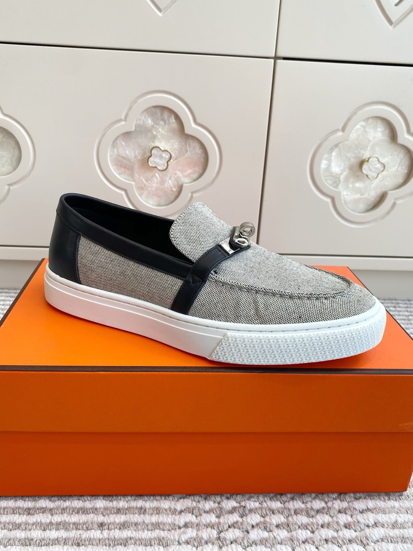 HERMES 25S SLIP-ON IN GREY CANVAS AND BLACK LAMBSKIN WITH SILVER HARDWARE
