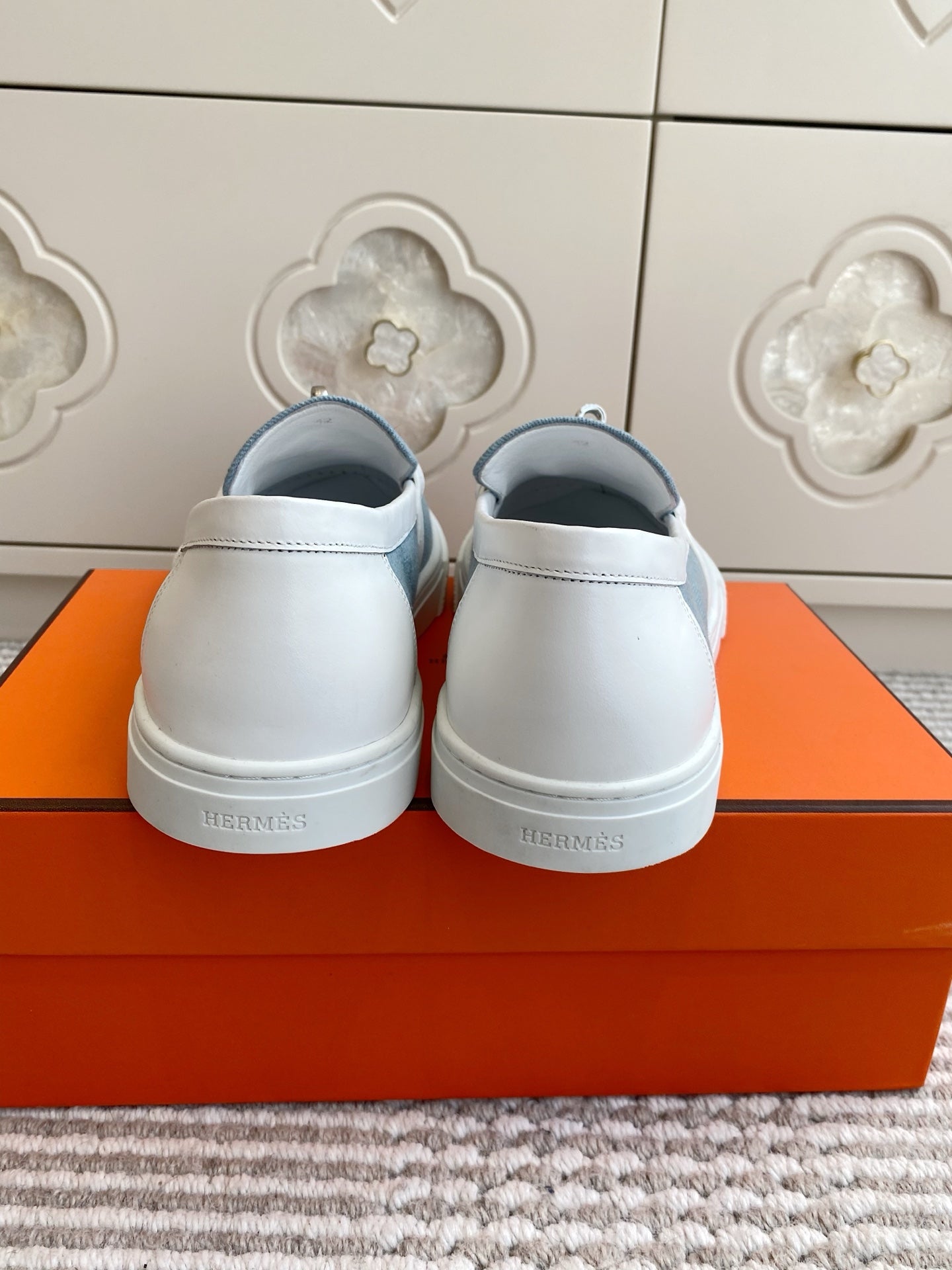 HERMES 25S SLIP-ON IN SKY BLUE CANVAS WITH SILVER HARDWARE