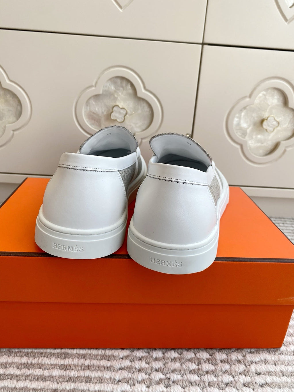 HERMES 25S SLIP-ON IN LIGHT GREY CANVAS WITH SILVER HARDWARE