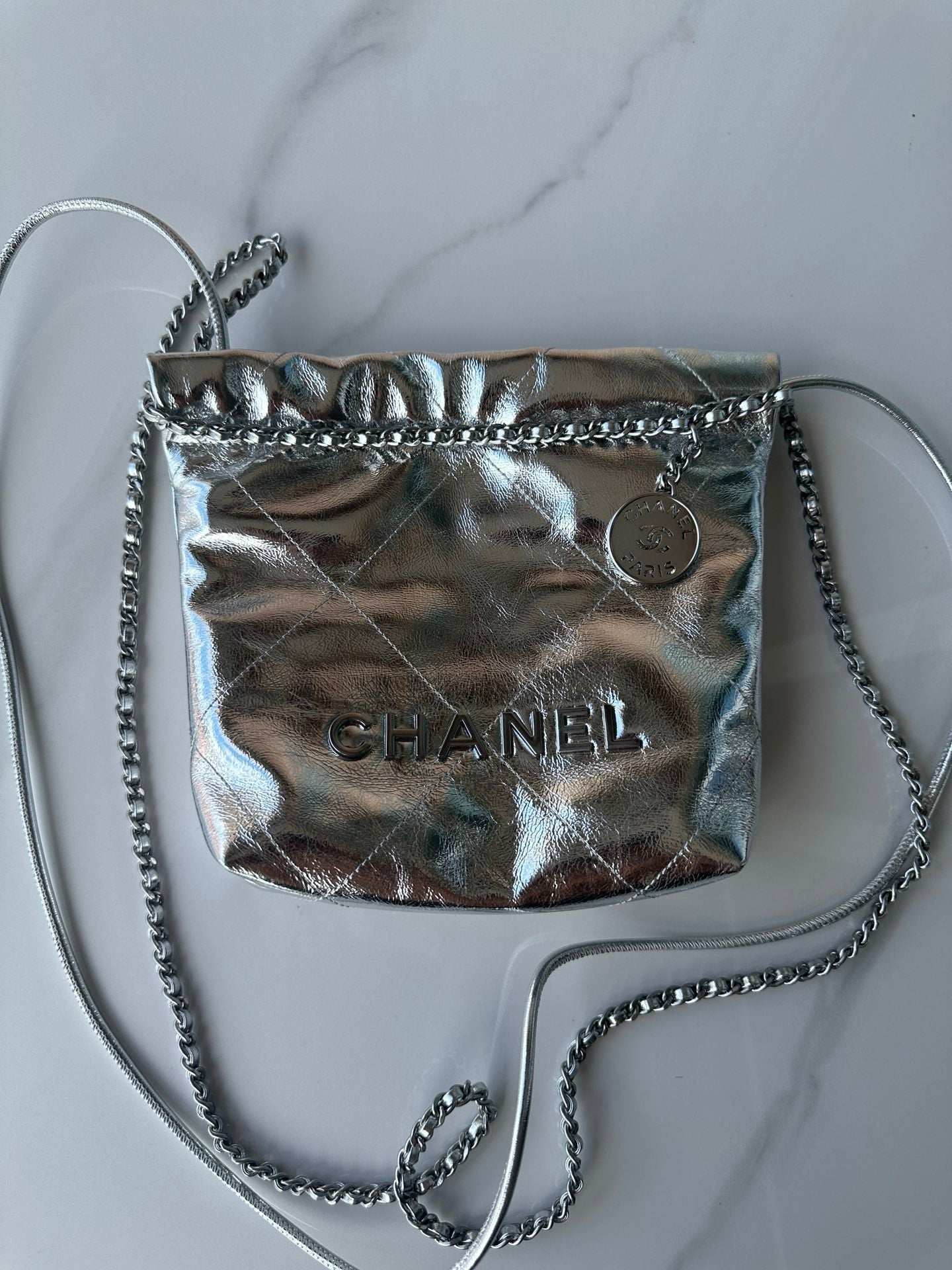 CHANEL MINI 20 BAG IN SILVER METALLIC LAMBSKIN