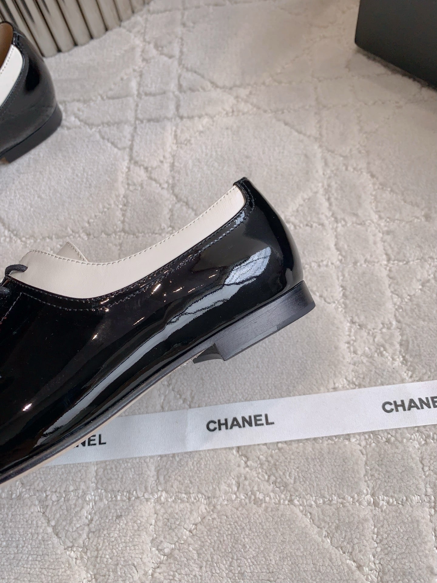 CHANEL 25S TWO TONE LACE UP IN BLACK AND WHITE SHINY CALFSKIN