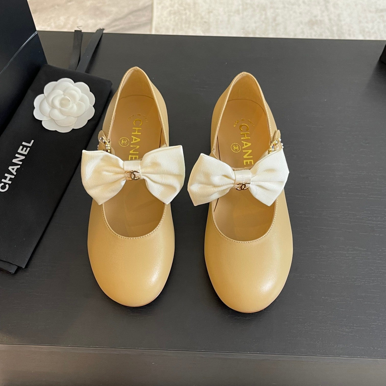 CHANEL BALLET FLAT DARK CREAM LAMBSKIN WITH WHITE BOW