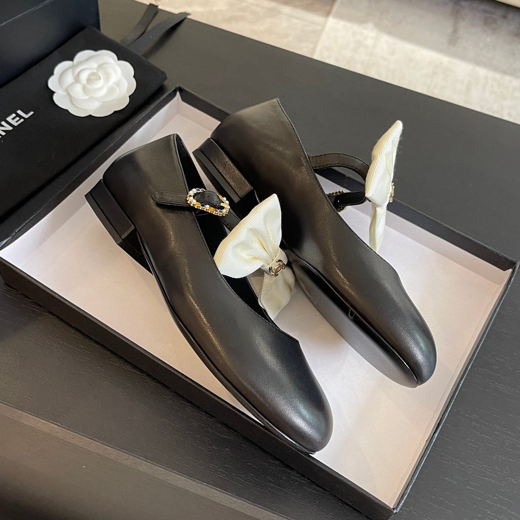 CHANEL BALLET FLAT BLACK LAMBSKIN WITH WHITE BOW