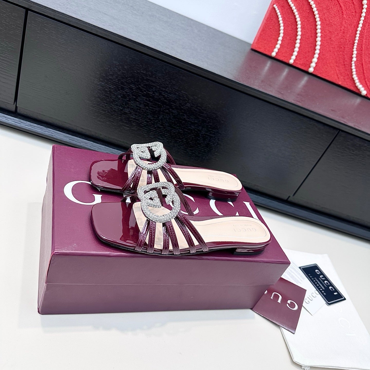 GUCCI 26S FLAT SLIDES IN DARK RED CALFSKIN WITH CRYSTAL