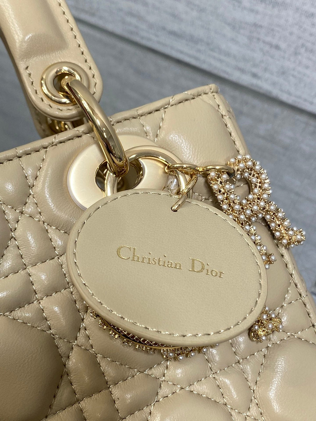 DIOR 25S LADY  BAG 20 IN SAND BEIGE CALFSKIN CHARM PEARL EMBELLISHMENTS