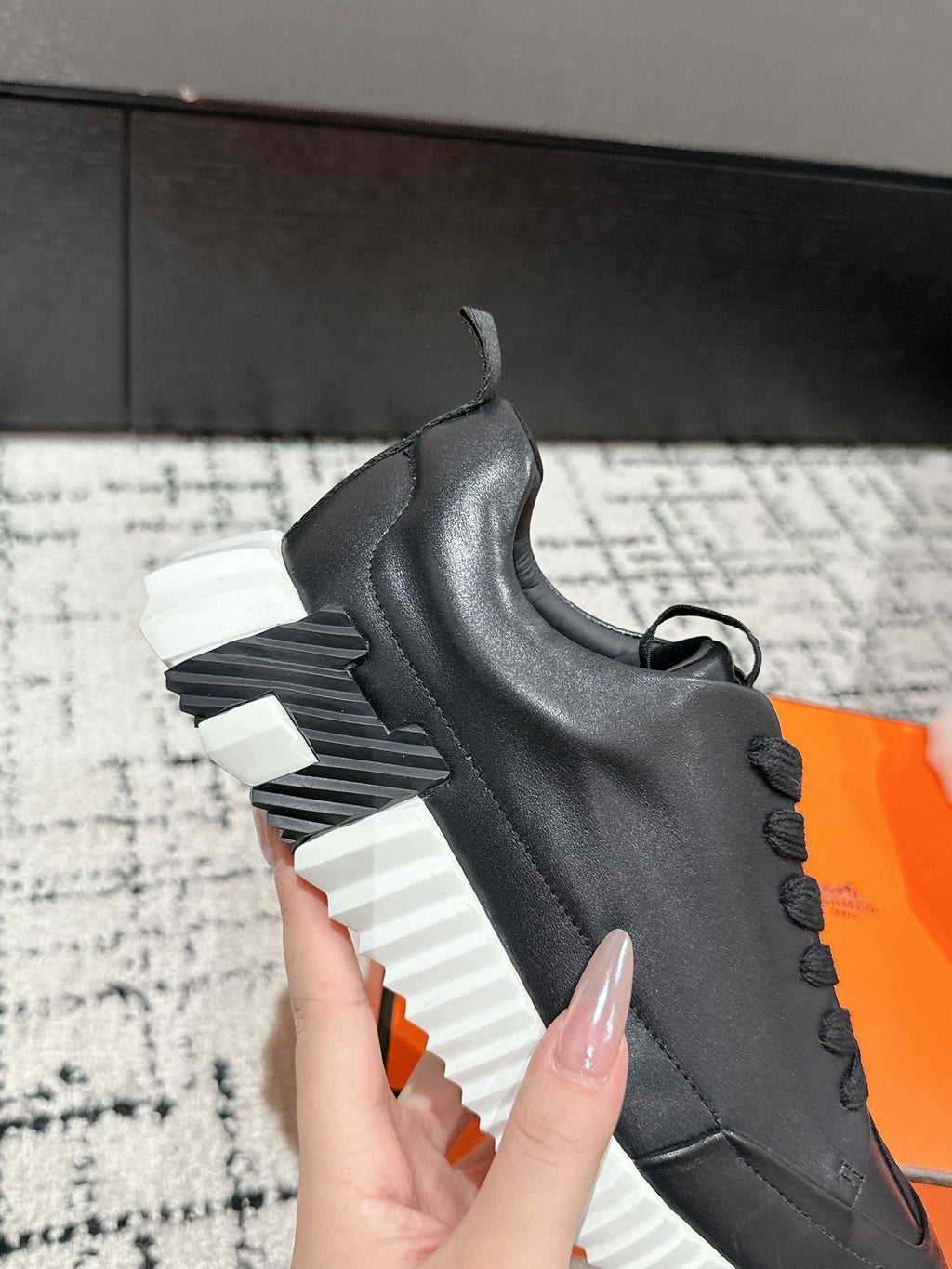 HERMES BOUNCING SNEAKER IN BLACK CALFSKIN