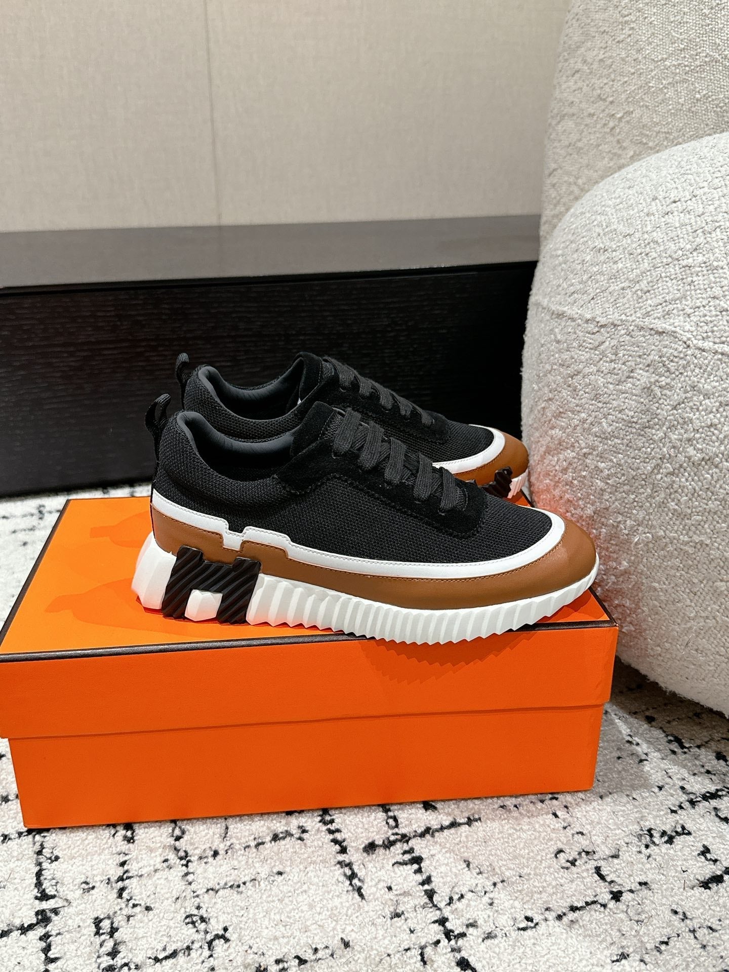 HERMES BOUNCING SNEAKER IN BRONZE BROWN CALFSKIN AND BLACK FABRIC