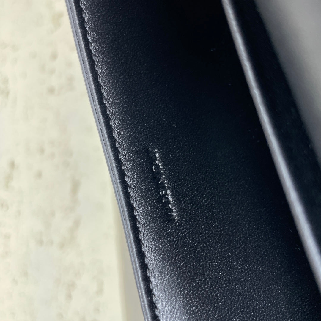 CELINE LOLA BAGUETTE BAG 28 IN BLACK MIX WHITE MONOGRAM CANVAS AND CALFSKIN