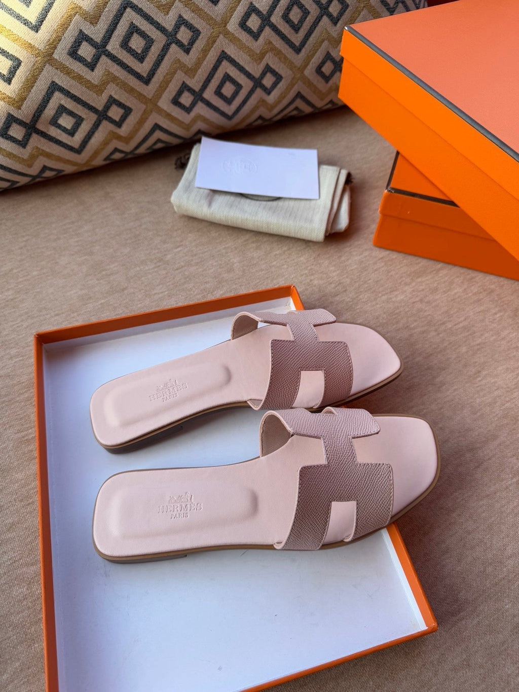 HERMES 0RAN SANDALS IN PASTEL PINK CALFSKIN