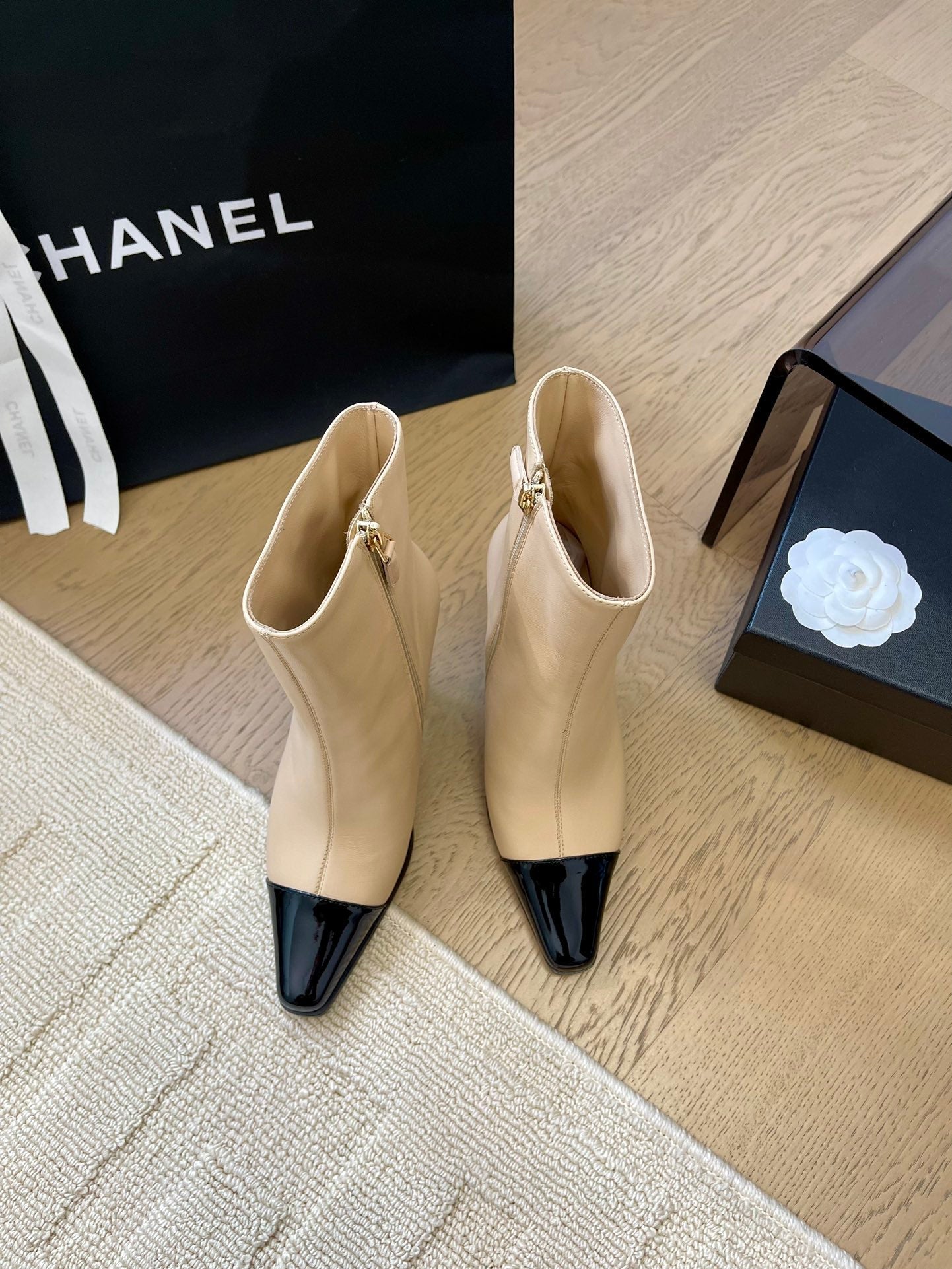 CHANEL BONGADE BOOTS IN BEIGE MIX BLACK CALFSKIN