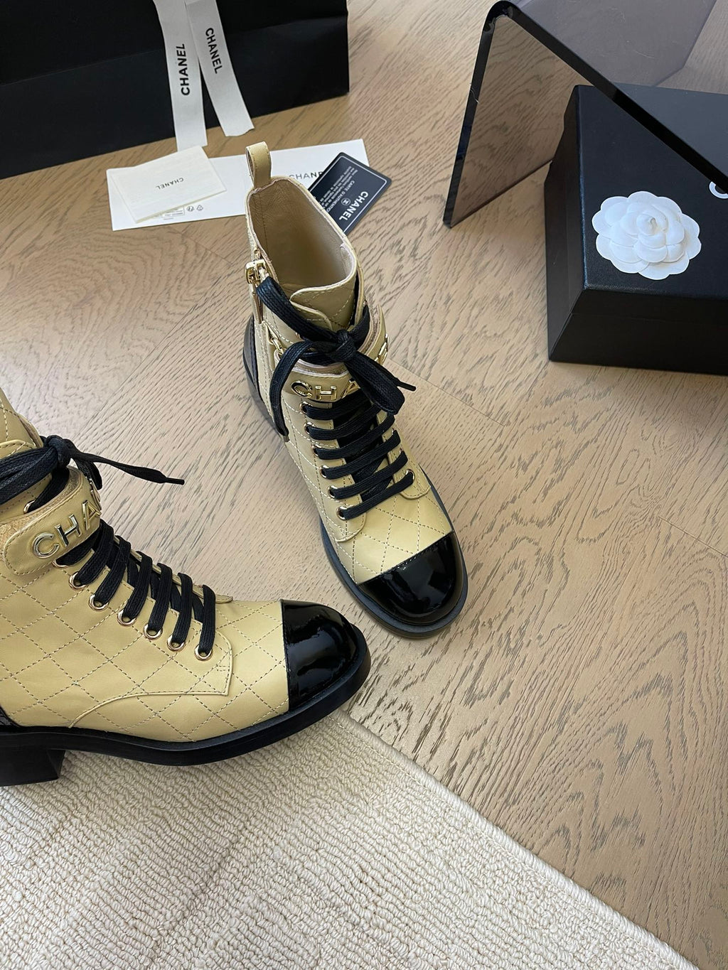 CHANEL ALPHABET MARTIN BOOTS IN FLAX YELLOW LAMBSKIN