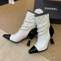 CHANEL HIGH HEELS 8CM BOOTS IN WHITE MIX BLACK CALFSKIN WITH PEARL CHAIN