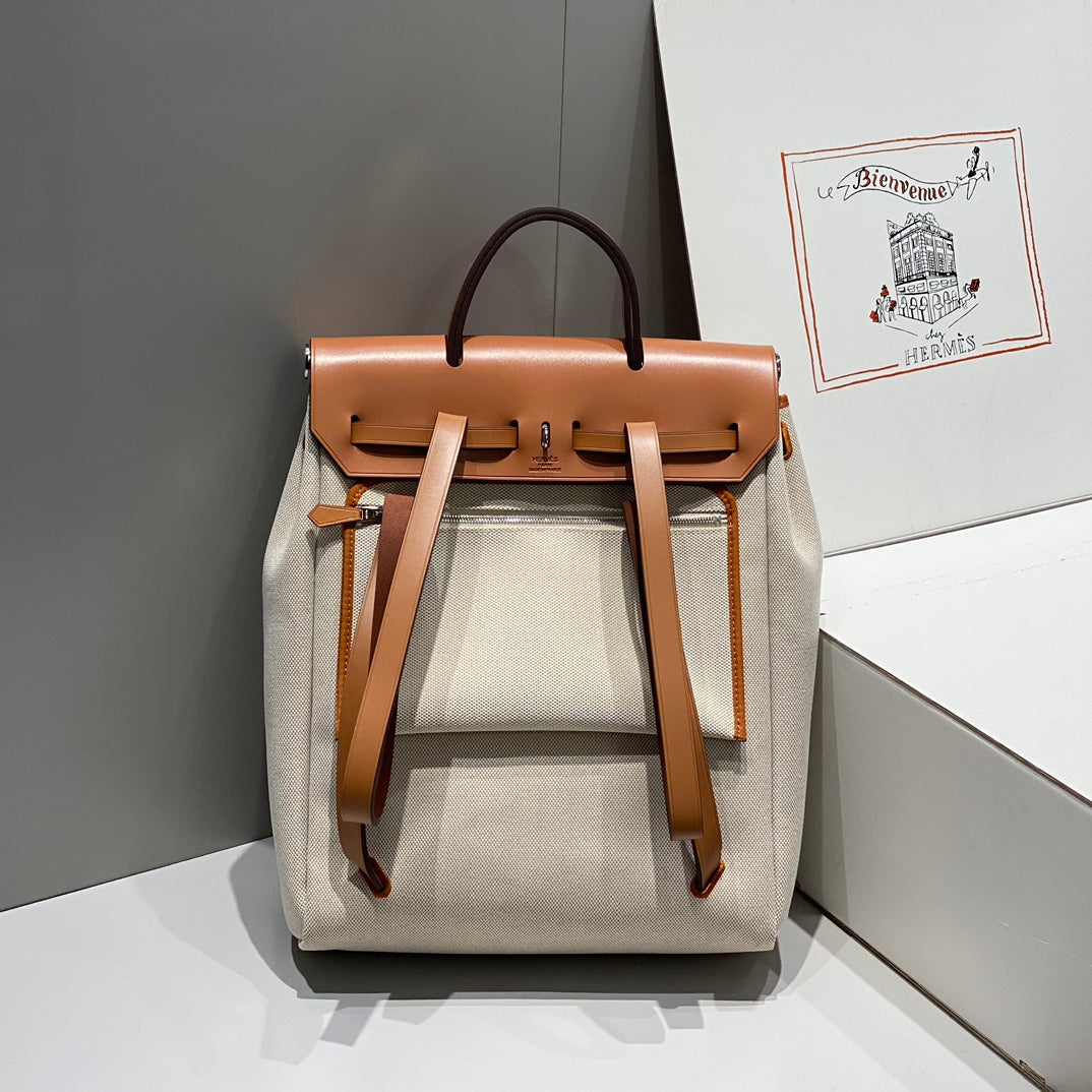 HERMES HERBAG A DOS ZIP RETOURNE BACKPACK 29 IN OFF-WHITE CANVAS AND BROWN CALFSKIN