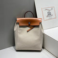 HERMES HERBAG A DOS ZIP RETOURNE BACKPACK 29 IN OFF-WHITE CANVAS AND BROWN CALFSKIN