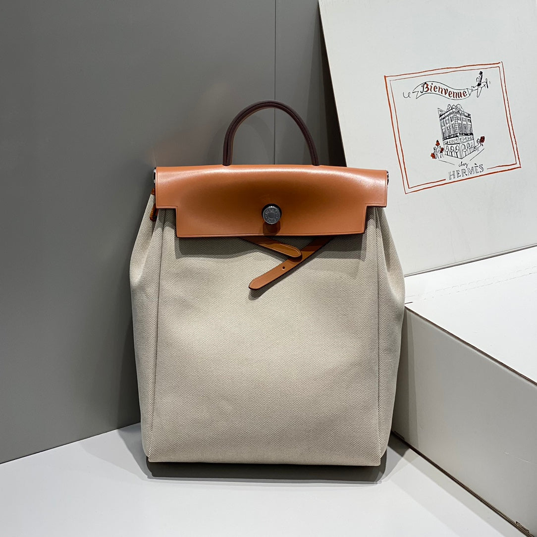 HERMES HERBAG A DOS ZIP RETOURNE BACKPACK 29 IN OFF-WHITE CANVAS AND BROWN CALFSKIN