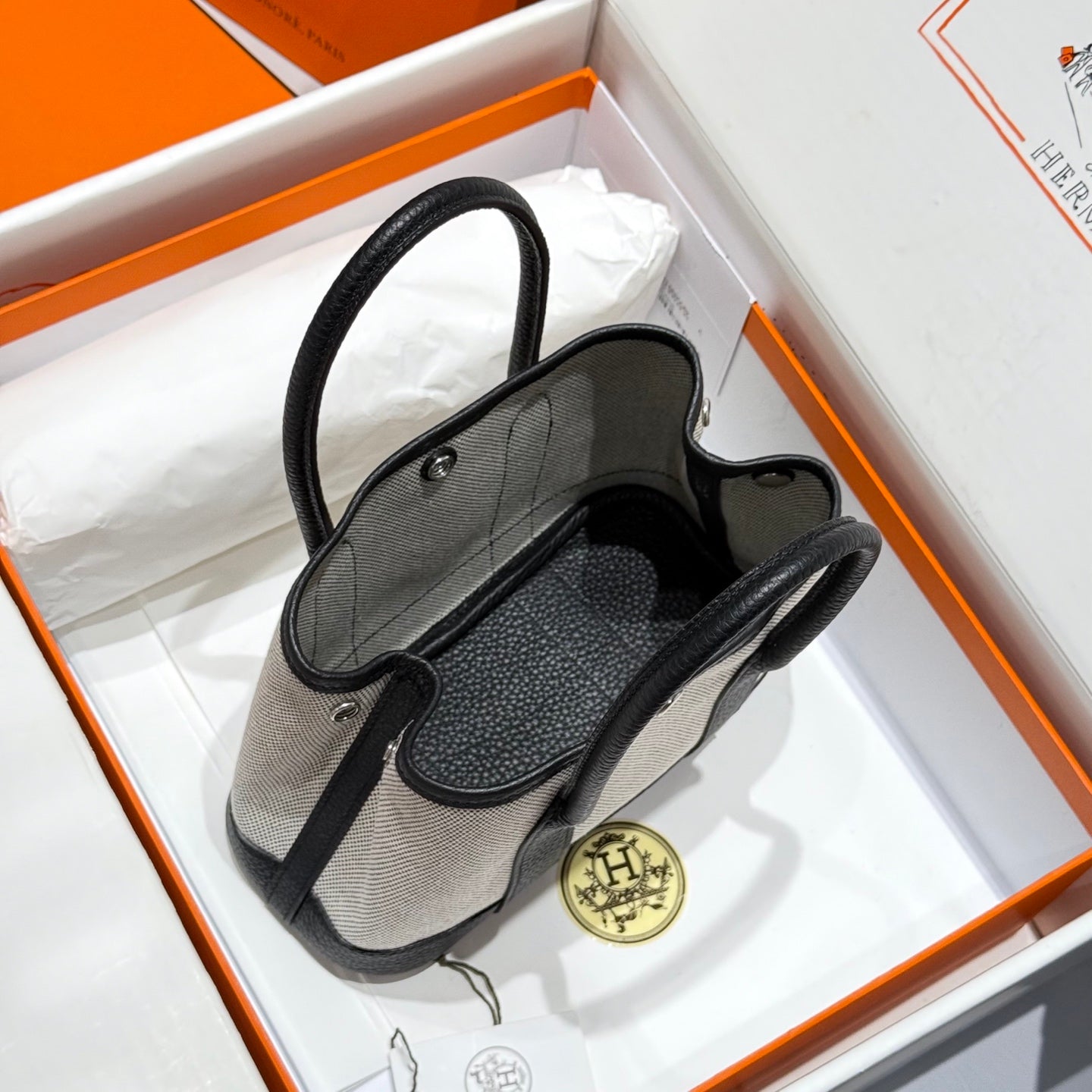 HERMES GARDEN PARTY 23CM IN WHITE TOILETS COTTON CANVAS AND BLACK CALFSKIN