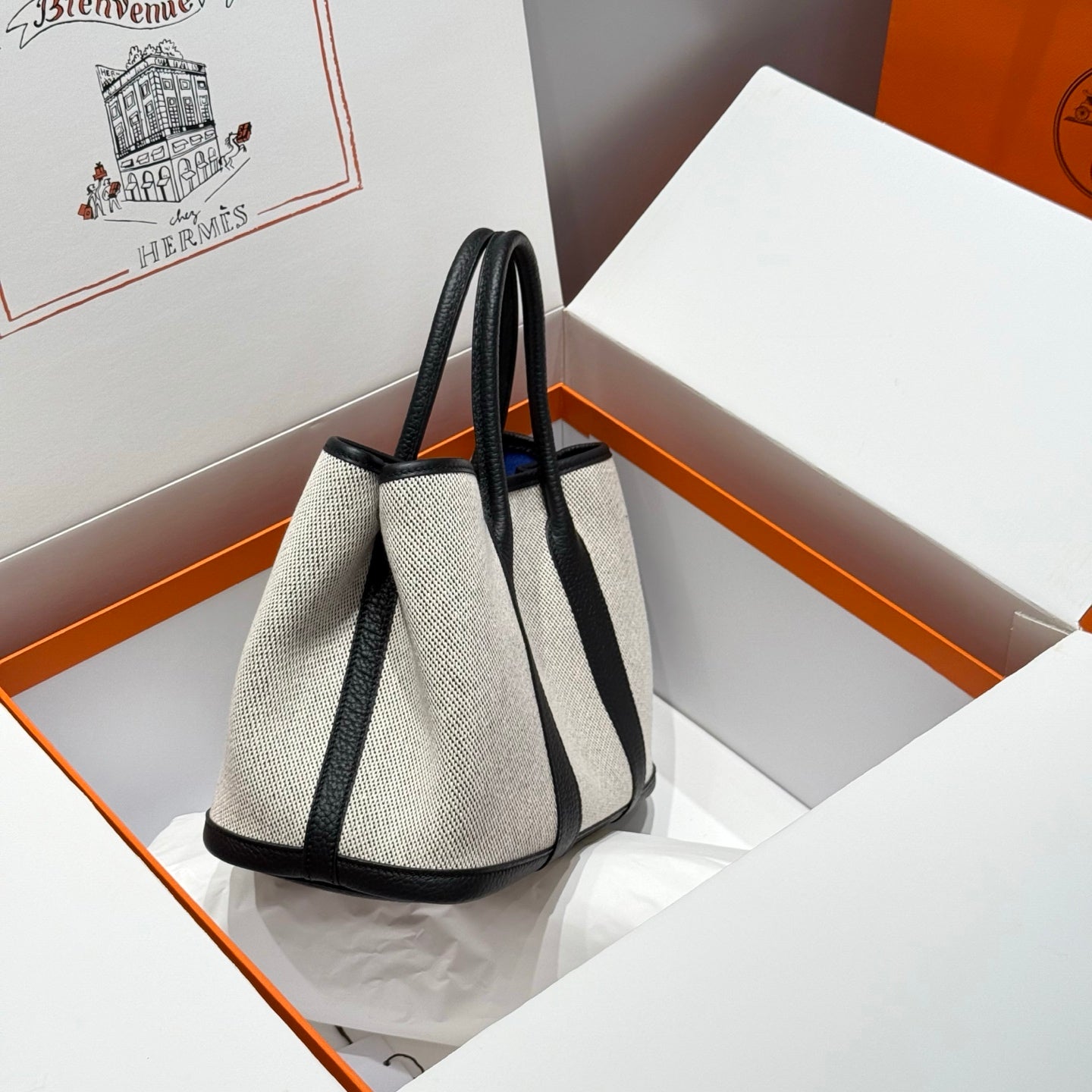 HERMES GARDEN PARTY 30CM IN WHITE TOILETS COTTON CANVAS AND BLACK CALFSKIN BLUE CANVAS ON SIDE OTHER