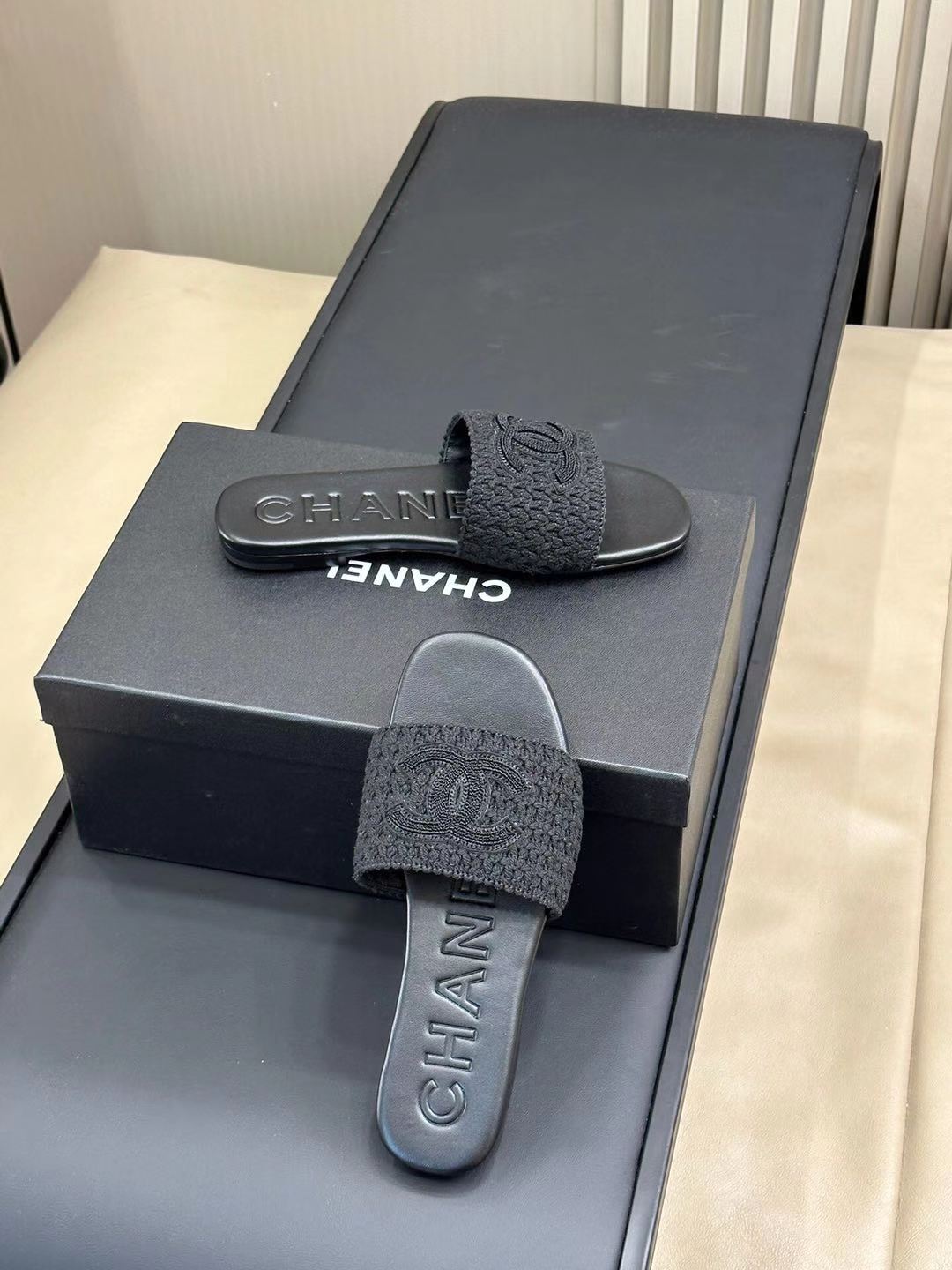 CHANEL WOVEN SLIPPERS BLACK COWHIDE SOLE
